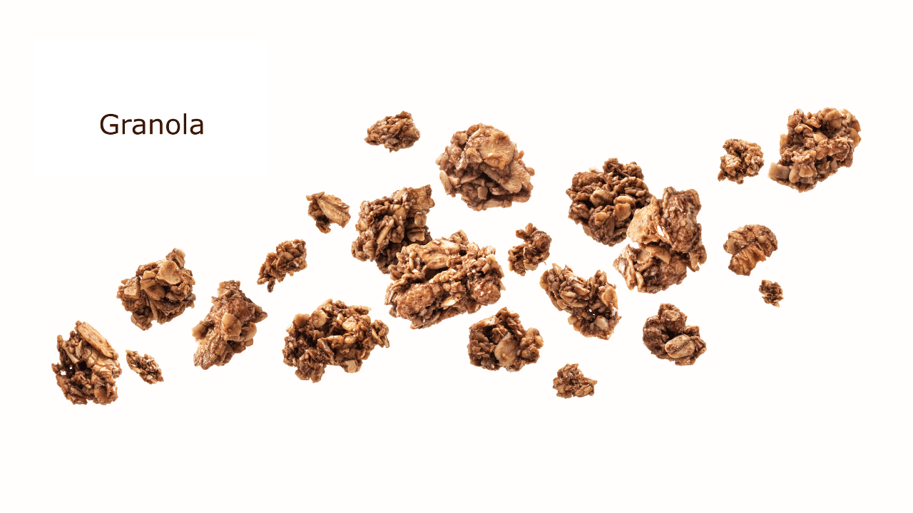 Close-up of granola clusters on a white background